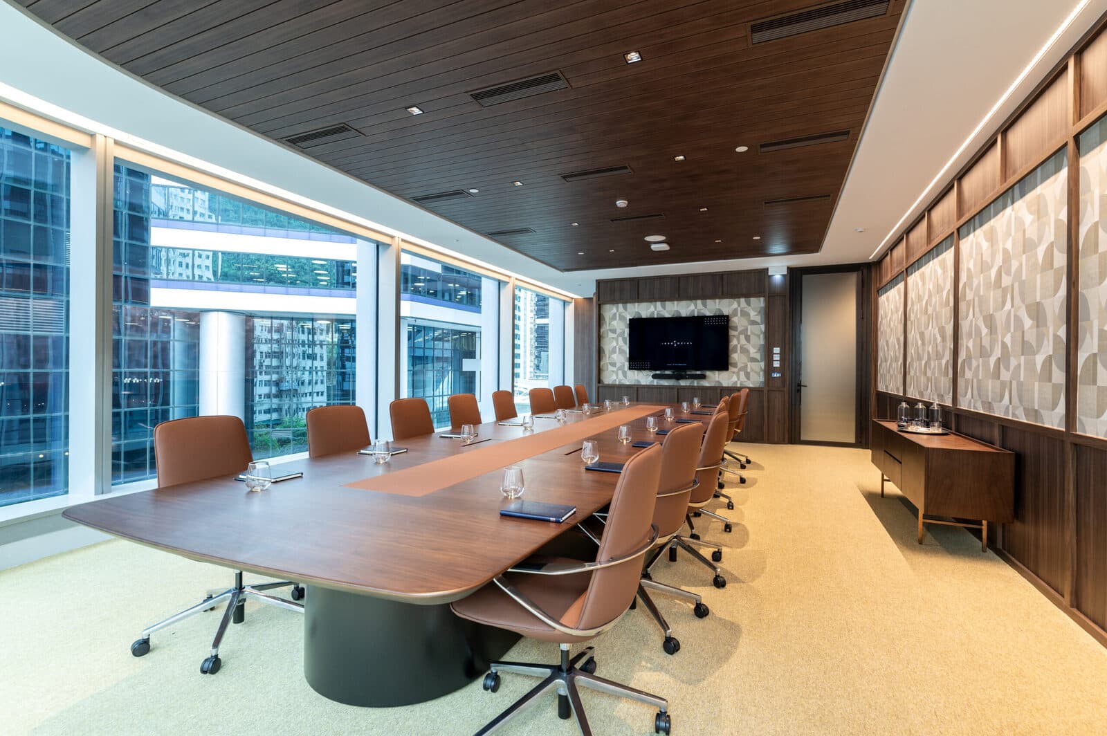 A senior executive consulting with a personal reputation specialist in a discreet office